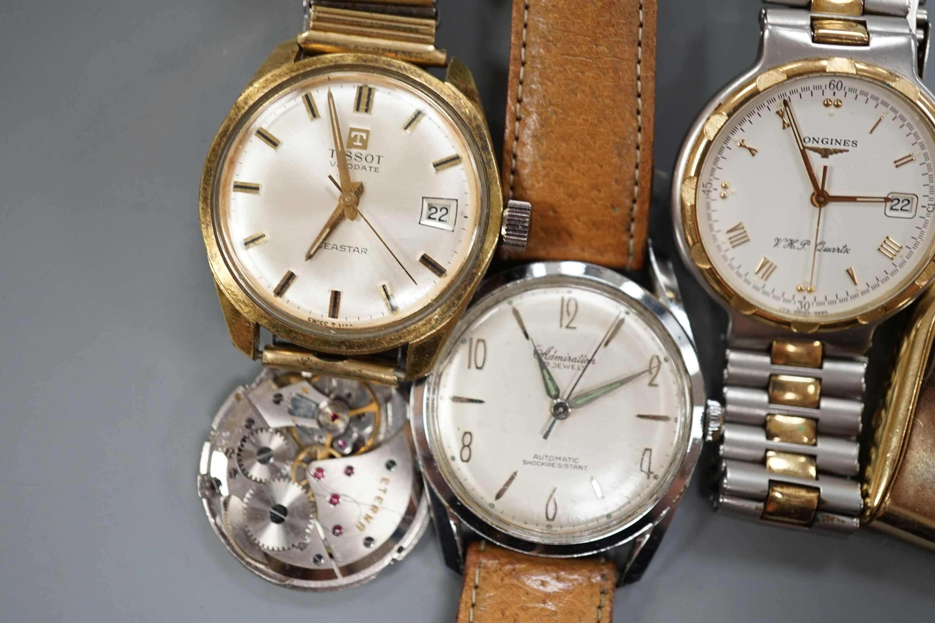 Three gentleman's wrist watches, Tissot, Longines VHP quartz and Admiration, an Eterna movement and a Jaeger LeCoultre travelling watch.